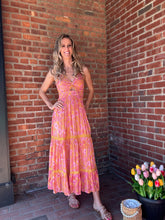 Load image into Gallery viewer, Marigold | Maxi Dress with Center Cutout
Effortlessly chic! All eyes will be on you in this stunning dress featuring a sultry deep V-neck and alluring cutout. Perfect for a night out or special event, you'll feel confident and beautiful. The spaghetti straps add a touch of femininity, while the maxi length elongates your figure. A must-have for any fashion-forward wardrobe.