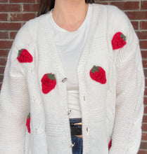 Load image into Gallery viewer, Strawberry Fields Cardigan in White
Experience the height of comfort and style with our Strawberry Fields Cardigan. Made with high-quality materials, this stunning white cardigan radiates sophistication and charm. Featuring a timeless design and flawless craftsmanship, our cardigan is the must-have addition to your wardrobe, effortlessly elevating any outfit with its blend of glamour and coziness. Don't miss out on the Strawberry Fields Cardigan, the perfect embodiment of refined taste and exquisite fashio