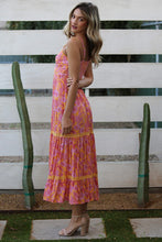 Load image into Gallery viewer, Marigold | Maxi Dress with Center Cutout

Effortlessly chic!&nbsp; All eyes will be on you in this stunning dress featuring a sultry deep V-neck and alluring cutout. Perfect for a night out or special event, you&#39;ll feel confident and beautiful. The spaghetti straps add a touch of femininity, while the maxi length elongates your figure. A must-have for any fashion-forward wardrobe.
