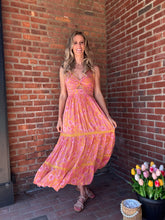 Load image into Gallery viewer, Marigold | Maxi Dress with Center Cutout

Effortlessly chic!&nbsp; All eyes will be on you in this stunning dress featuring a sultry deep V-neck and alluring cutout. Perfect for a night out or special event, you&#39;ll feel confident and beautiful. The spaghetti straps add a touch of femininity, while the maxi length elongates your figure. A must-have for any fashion-forward wardrobe.
