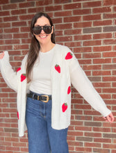Load image into Gallery viewer, Strawberry Fields Cardigan in White

Experience the height of comfort and style with our Strawberry Fields Cardigan. Made with high-quality materials, this stunning white cardigan radiates sophistication and charm. Featuring a timeless design and flawless craftsmanship, our cardigan is the must-have addition to your wardrobe, effortlessly elevating any outfit with its blend of glamour and coziness. Don&#39;t miss out on the Strawberry Fields Cardigan, the perfect embodiment of refined taste and exquisite fashio
